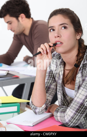 Student lost in thought Stock Photo