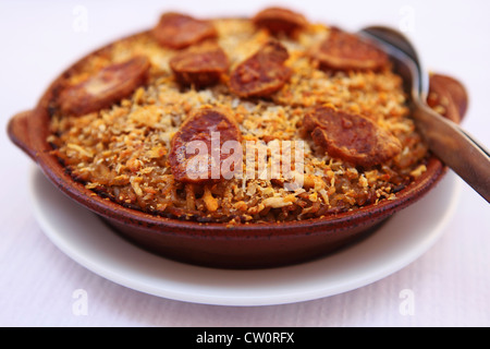 The traditional Portuguese dish of Arroz de Pato (rice with duck) is served. Stock Photo