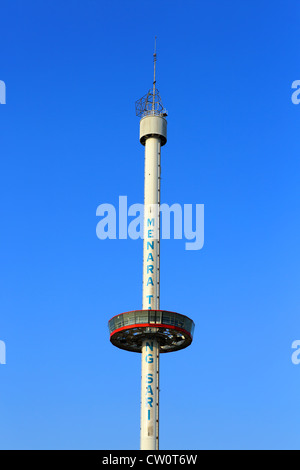 Menara taming Sari (360 degree revolving viewing tower) tower rising to its eight meter height in Melaka, Malaysia. Stock Photo