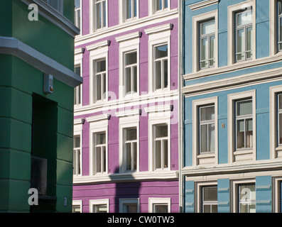 Parts of old apartment blocks in central Oslo Norway painted in a colourful manner