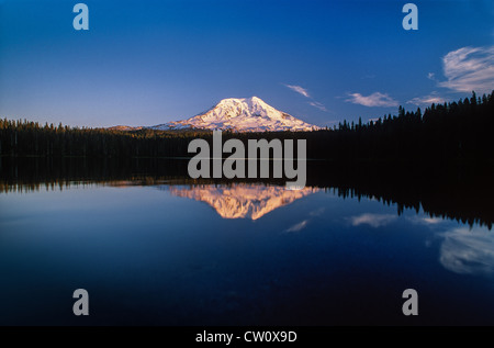 Image of Mt Adams and its reflection in Takhlakh Lake near sunset with ...