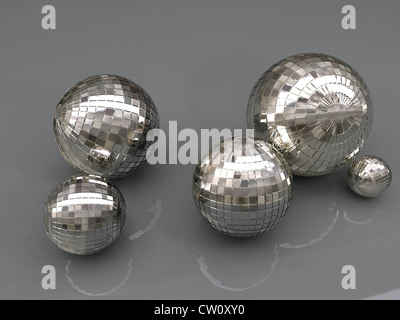 glitter balls on reflective plane Stock Photo