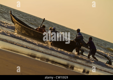 Tourists heading out for a trip on Mandrem Beach, Goa Stock Photo