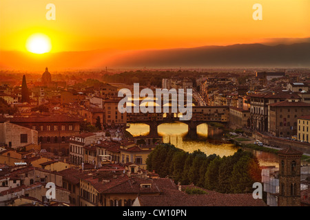 Florence, Arno River and Ponte Vecchio at sunset, Italy Stock Photo