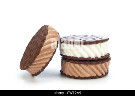 Chocolate and vanilla ice cream sandwiches on a white background. Stock Photo