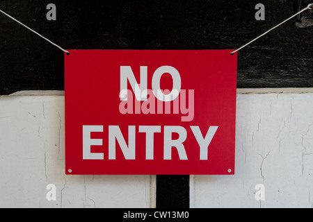 No entry sign hanging on door Stock Photo