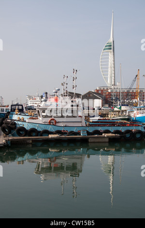 City of Portsmouth, England. Commercial boats berthed at Camber Docks with the Spinnaker Tower in the background. Stock Photo