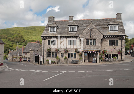 The Bankes Arms Hotel on the amazingly empty main road through Corfe Castle, Dorset, UK. Stock Photo