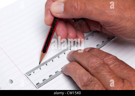 Measuring with a rule Stock Photo