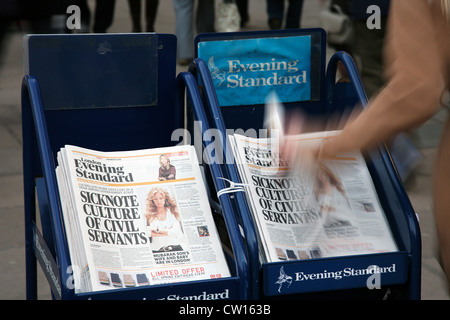 London, UK - February 17, 2011: A pile of popular Evening Standard, free daily newspaper, evening tabloid paper, made available Stock Photo