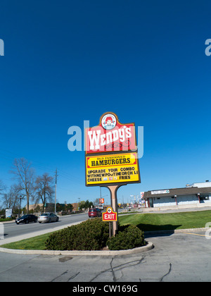 Advertising signs for Wendy's fast food hamburger milkshake restaurant Fort Erie, Ontario, Canada KATHY DEWITT Stock Photo