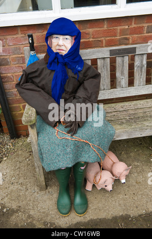 Effigy of The Queen sat on bench during Scarecrow Day in village of Brampton Bryan Herefordshire England UK Stock Photo