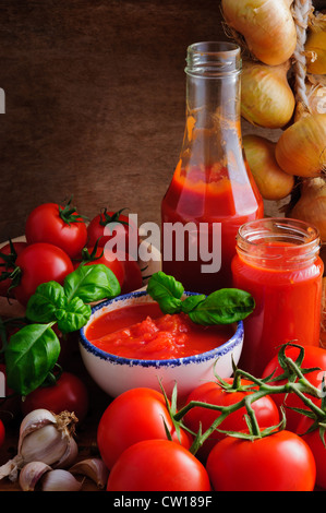 Still life with traditional homemade tomato sauce and ingredients Stock Photo