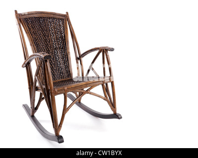 Antique wooden wicker rocking chair isolated on white background Stock Photo