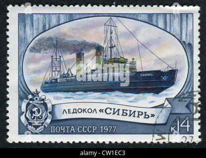 USSR - CIRCA 1977: Postage stamps printed in the USSR, shows the Russian icebreaker 'Sibir', circa 1977 Stock Photo