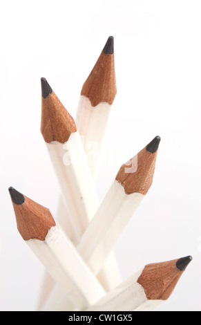 Five white sharp pencils pointed up isolated on white background with copy space. Stock Photo