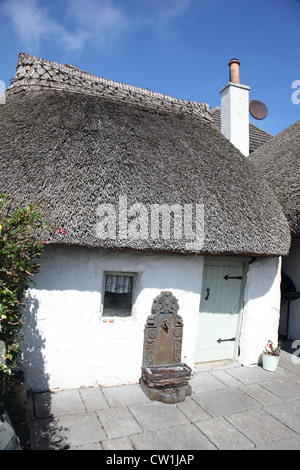 Thatched cottage in the fishing village of Clogherhead, Co. Louth, Ireland Stock Photo