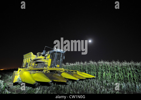 Combine in a corn field at night, near Kibbutz Mevo Hama in the Golan Heights, Photo by Shay Levy Stock Photo