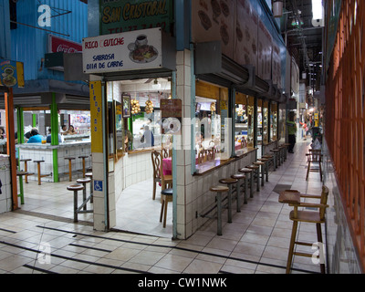 SAN JOSE, COSTA RICA - CIRCA AUGUST 2012: Alley in the Central Market circa 2012 in San Jose, a very popular attraction and the biggest market in the city  with more than 10.000 daily visitors. Stock Photo