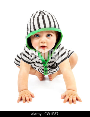 Lovely boy isolated on white background, sweet little baby wearing striped sliders, charming small kid in black & white hoodie Stock Photo