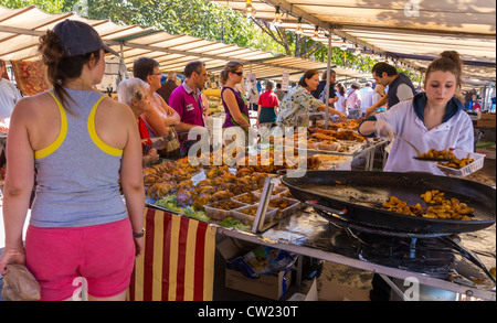 Paris, France, Crowd Customers, People Shopping in Outdoor French Farmers Street Food Market Cooking Fried Potatoes, Vendor Stock Photo