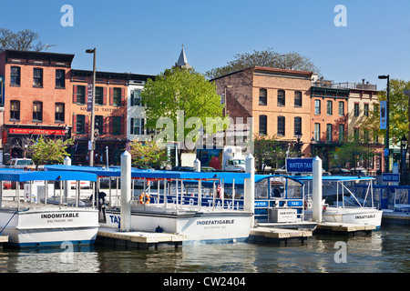 Thames Street and water taxis, Fells Point, Baltimore, Maryland Stock Photo