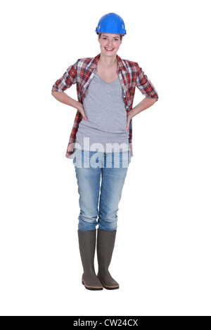 Full-length portrait of a smiling tradeswoman Stock Photo