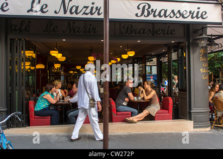 Paris, France, Medium Group People, sitting inside, Sharing Drinks, at tables, Coffee in Abesses Montmartre Area, French Bistro, Café Restaurants  'Le Nazir' Stock Photo