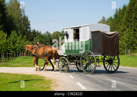 Wagon is making left turn from main road Stock Photo