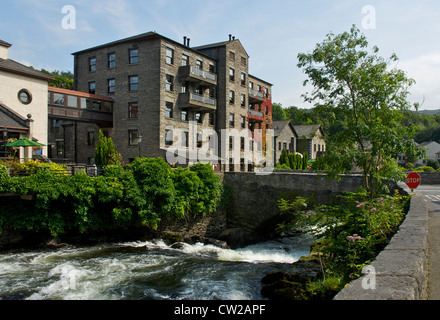 The Whitewater Hotel and the River Leven at Backbarrow, South Lakeland, Cumbria, England UK Stock Photo