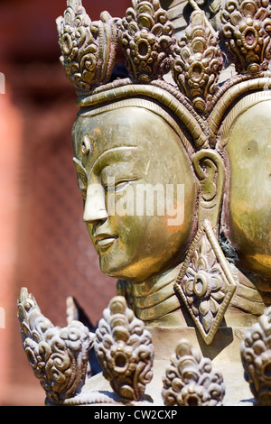 Detail of four-headed Brahma sculpture Stock Photo