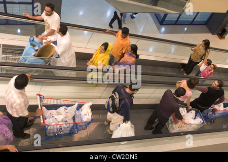 Dubai, people on an escalator in a shopping center Stock Photo