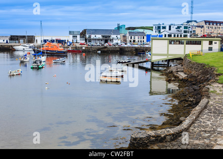 Portrush harbour with lifeboat and lifeboat station Stock Photo