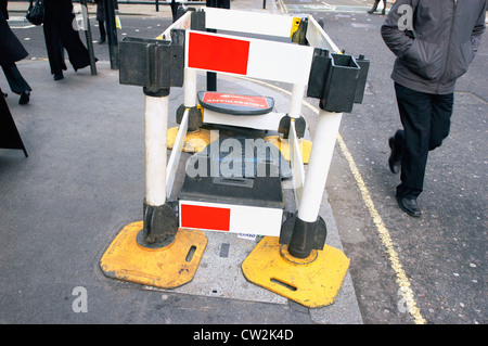 Pedestrian access obstructed by roadwork from utility company, UK. Stock Photo