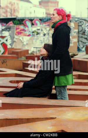 Berlin, two friends in the yard of the Kunsthaus Tacheles Stock Photo