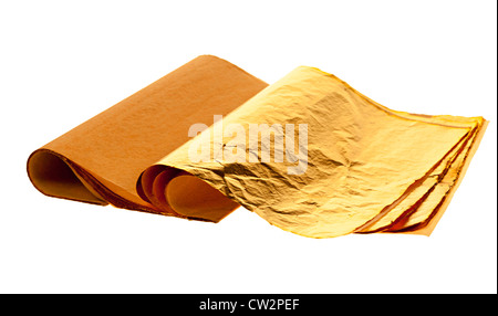 Book of gold leaf used by bookbinders for lettering on cover, UK Stock Photo