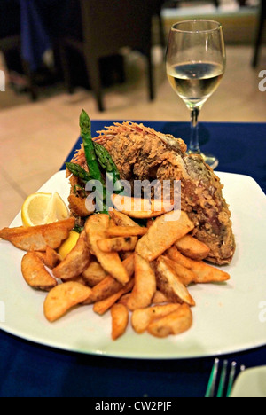 PUERTO RICO Embassy Suites Hotel Dorado Beach - restaurant table setting Stock Photo