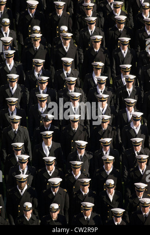 Midshipmen from the US Naval Academy march on to Lincoln Financial Field before the 2006 Army Navy game. Philadelphia PA. Stock Photo