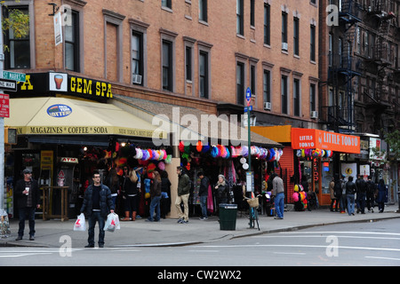 View people, Gem Spa news-stand, gift shop, Little Tokyo food store, St. Mark's Place at 2nd Avenue, East Village, New York Stock Photo