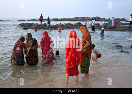Hindu women bathing in the sea. Kanyakumari. Cape Comorin. India Stock