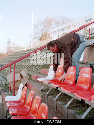 Karlsruhe - installing new seats in Wildparkstadion Stock Photo