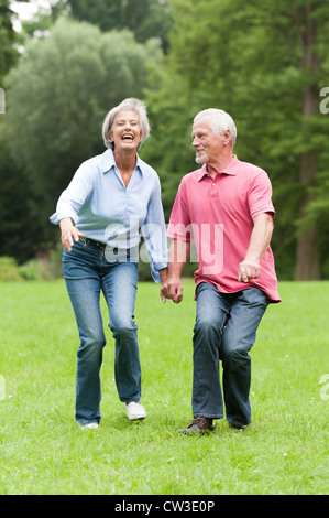 Active senior couple in the park Stock Photo