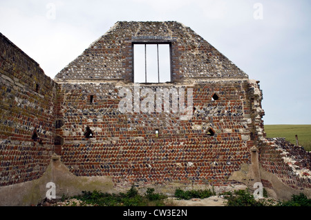 Mixed brick and stonework wall at the old Rathfinny farmhouse near Alfriston, East Sussex, UK Stock Photo