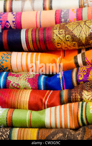 Ecuador, Quito area, Otavalo Handicraft Market. Traditional souvenir textile blankets. Stock Photo