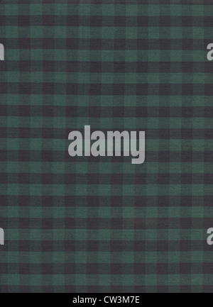 Black and green checkered tablecloth textile fabric background. Stock Photo