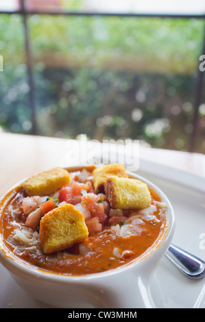 Delicious tomato soup on white background Stock Photo - Alamy
