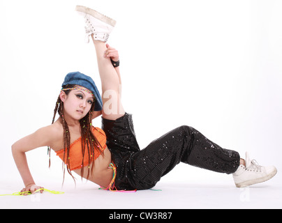 Cute girl in various dance costumes and fun poses. Stock Photo
