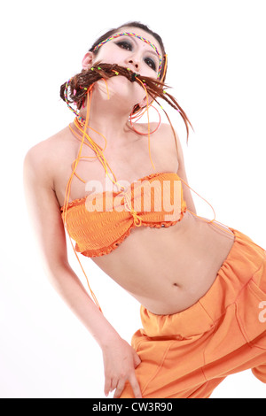 Cute girl in various dance costumes and fun poses. Stock Photo