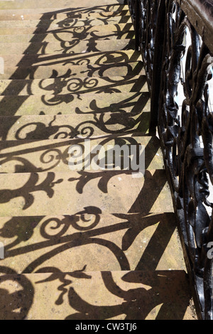 Shadow from decorative wrought iron work on the stairs up to the Midsteeple, Dumfries, Scotland, UK Stock Photo