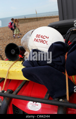 Beach Patrol uniform and hat pictured on a lifeguards 4x4 on Brighton Beach, East Sussex, UK. Stock Photo
